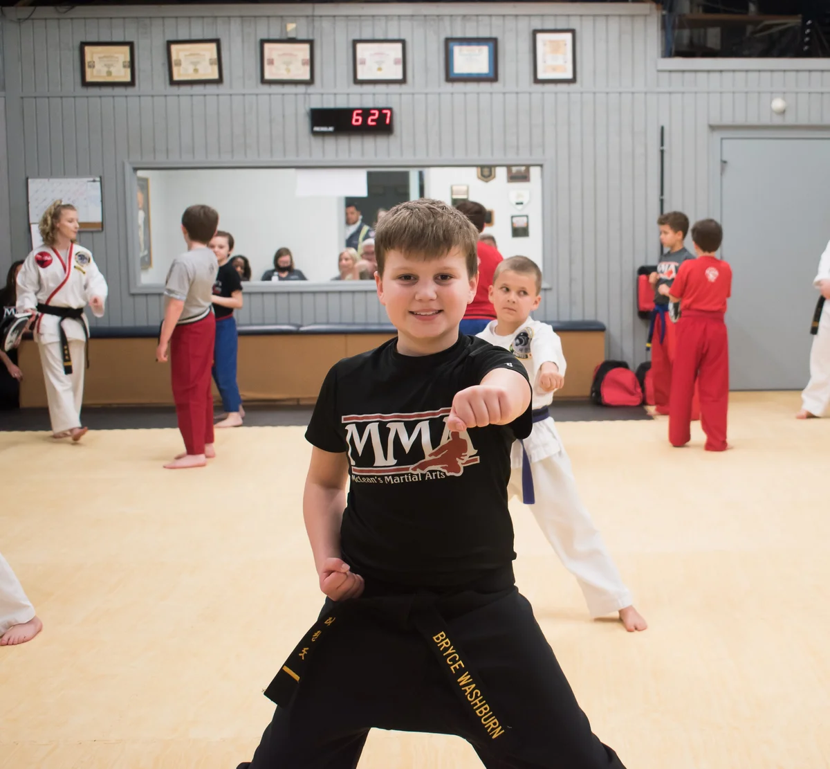 McLean's Martial Arts & Fitness academy logo