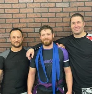 Modern Warrior Combatives And Jiu Jitsu academy logo