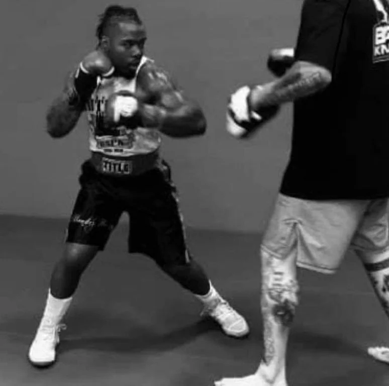 Checkered Past MMA academy logo