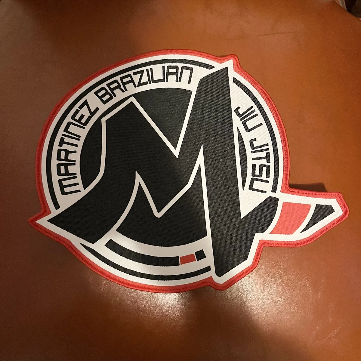 Martinez academy logo