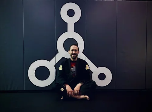 Inertia Brazilian Jiu Jitsu academy logo